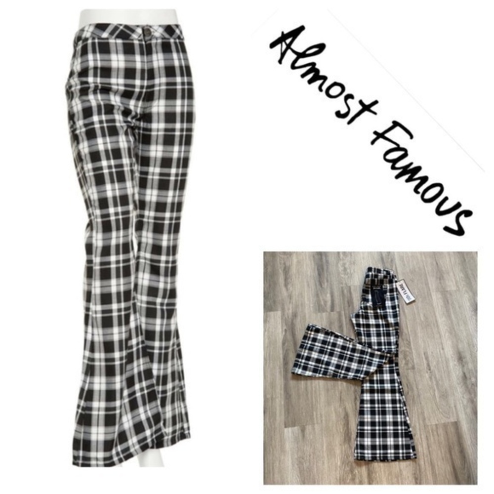 New with tags ALMOST FAMOUS 90’s FLARE pants. Size 5 with 31” inseam. Stretch.
